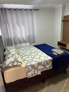 Flat Alto padrão com ar, piscina e academia